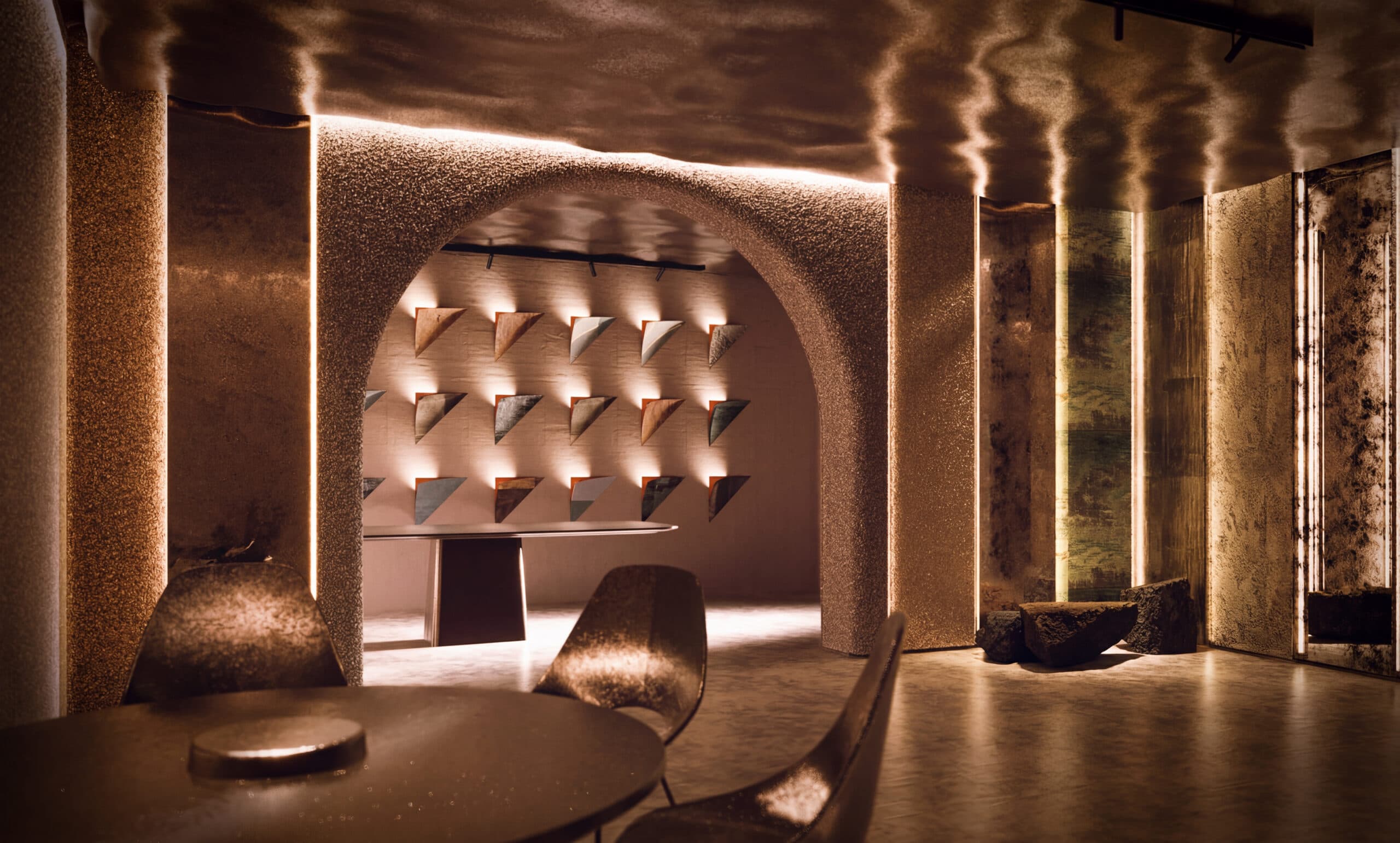 Novacolor showroom with textured metallic walls and an arched display of finish samples